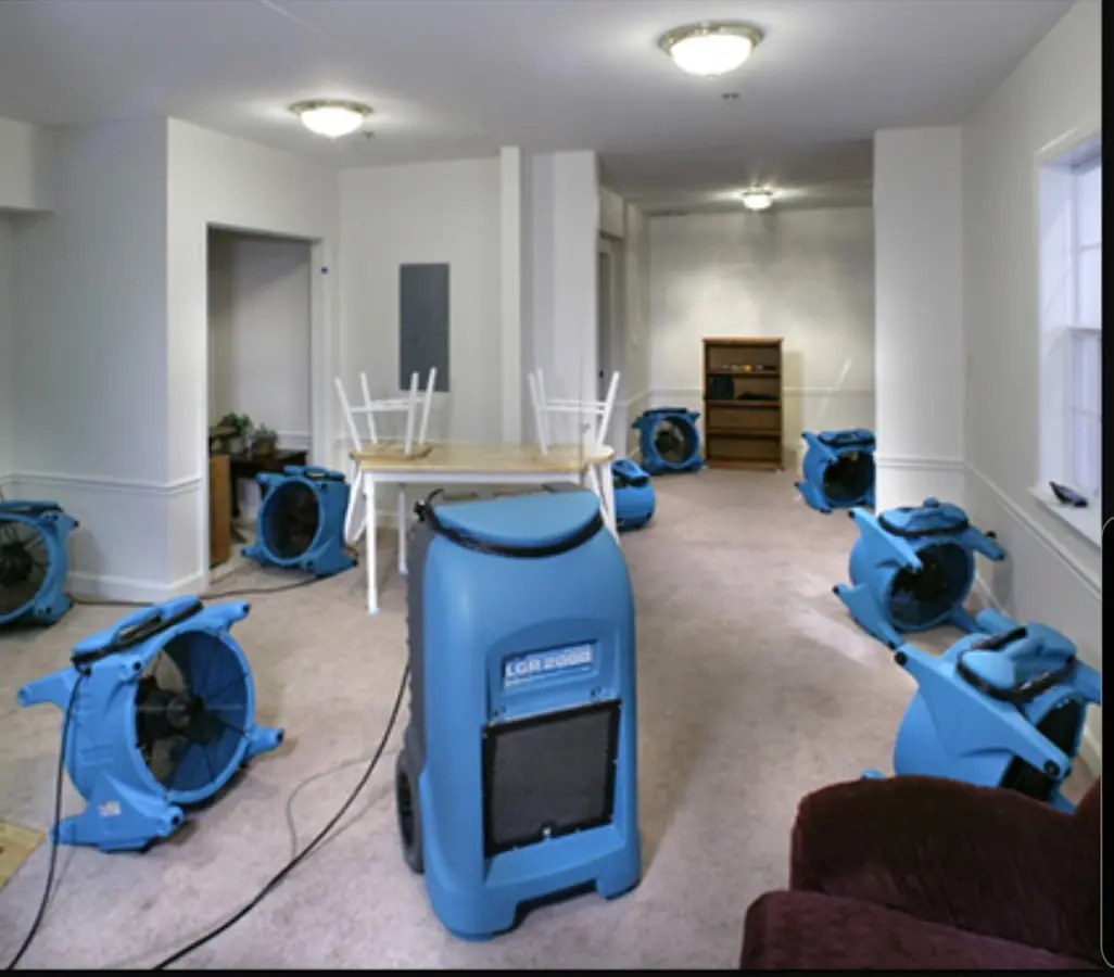 Air movers and dehumidifier setup for Water Damage Restoration in Spring Creek